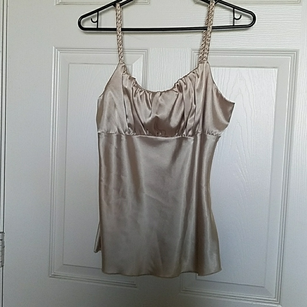 Gold shimmery top.